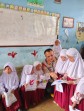 Misi Tim Trauma Healing Polda Riau Kembalikan Keceriaan Anak-anak Sekolah di Agam