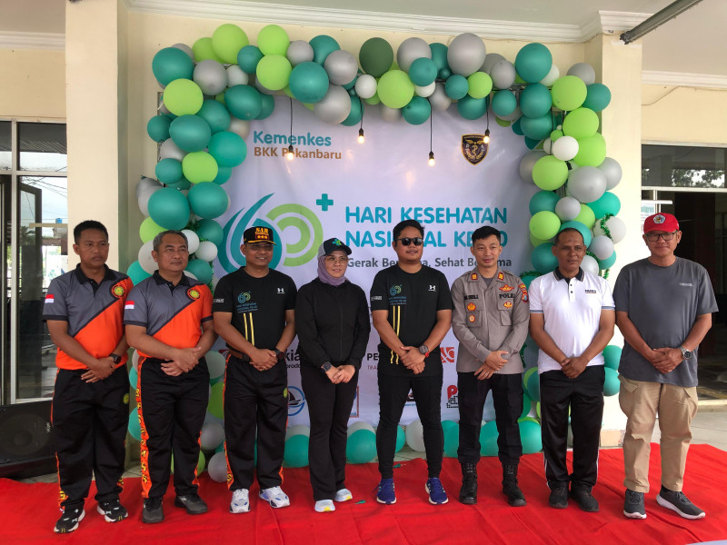 Kapolsek Kawasan Pelabuhan Hadiri Hari Kesehatan Nasional ke-60 di Pelabuhan Sungai Duku dan Laksanakan Cooling System