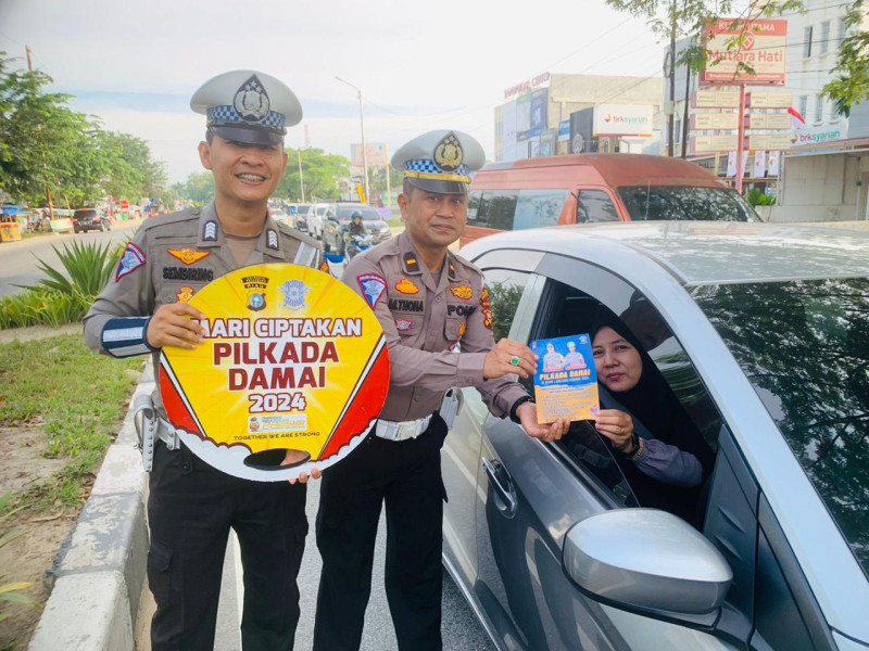 Kasat Lantas Polresta Pekanbaru Gelar Kegiatan Cooling System, Ajak Warga Dukung Pilkada Damai 2024