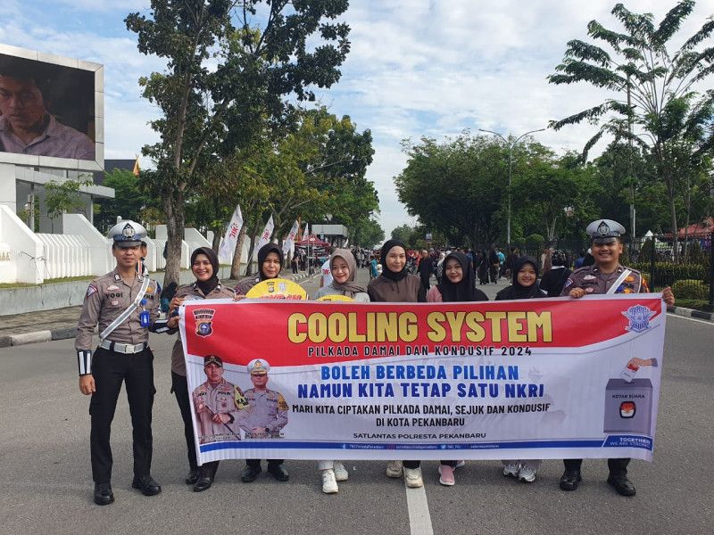 Hadir Bersama Masyarakat Saat CFD, Satlantas Polresta Pekanbaru Beri Edukasi Tentang Pilkada 2024