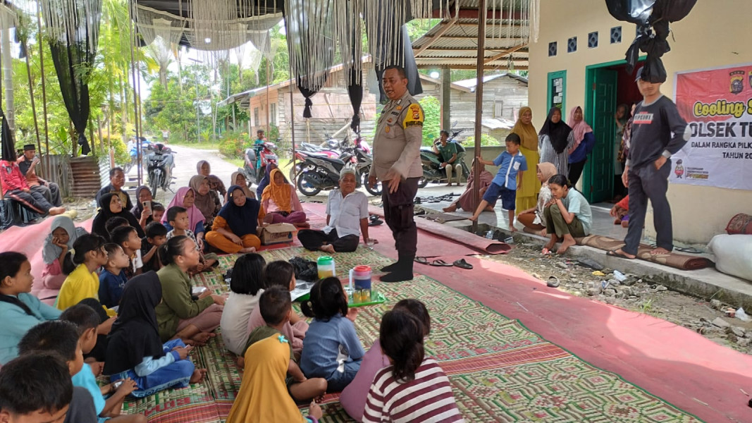 Bhabinkamtibmas  Polres Siak Efektifkan DDS Sebagai Sarana Cooling System  Pilkada Damai