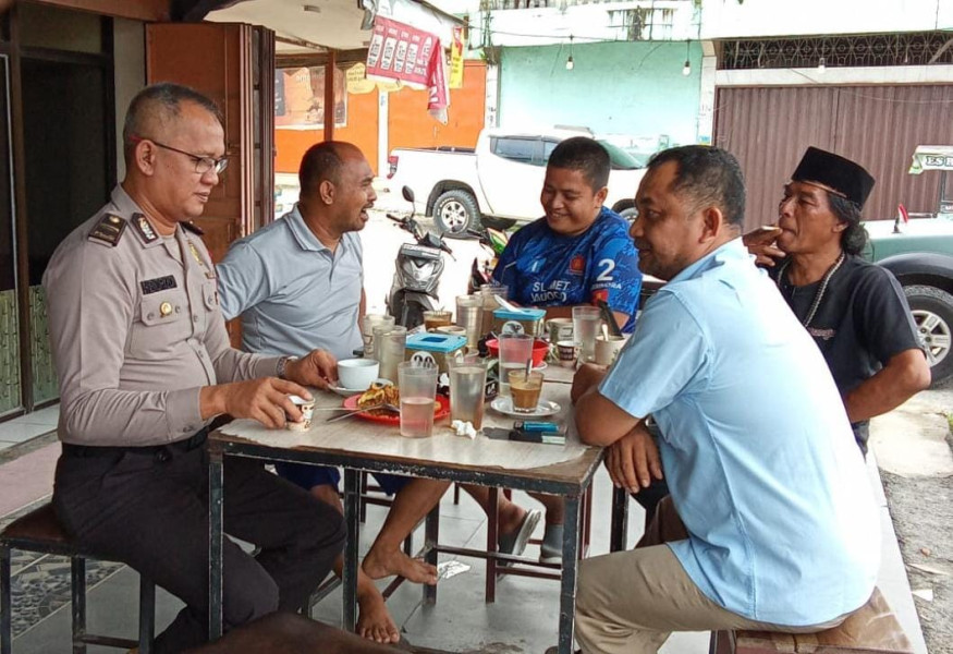 Sambangi Warga, Kanit Binmas Polsek Kandis Gelar Cooling System Kampanyekan Pilkada Damai 2024
