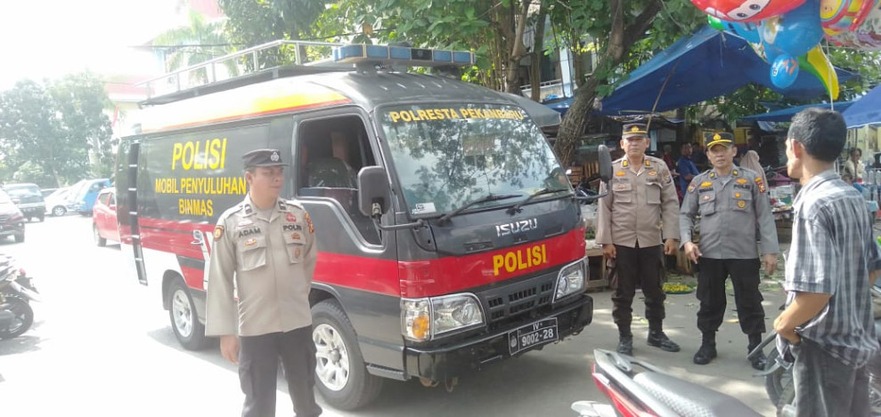 Sat Binmas Polresta Pekanbaru OTR LK 2024 Beri Imbauan Kamtibmas di Pasar Rumbai