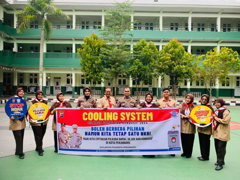Satlantas Polresta Pekanbaru Edukasi Pilkada Damai kepada Guru dan Siswa di SD Al-Azhar