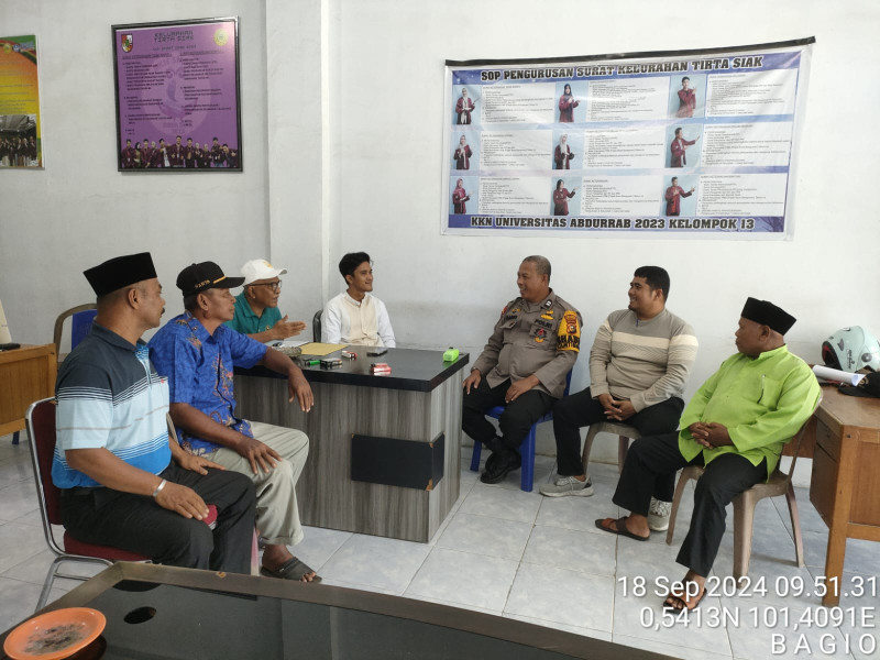 Bhabinkamtibmas Payung Sekaki Laksanakan Cooling System Jelang Pilkada 2024