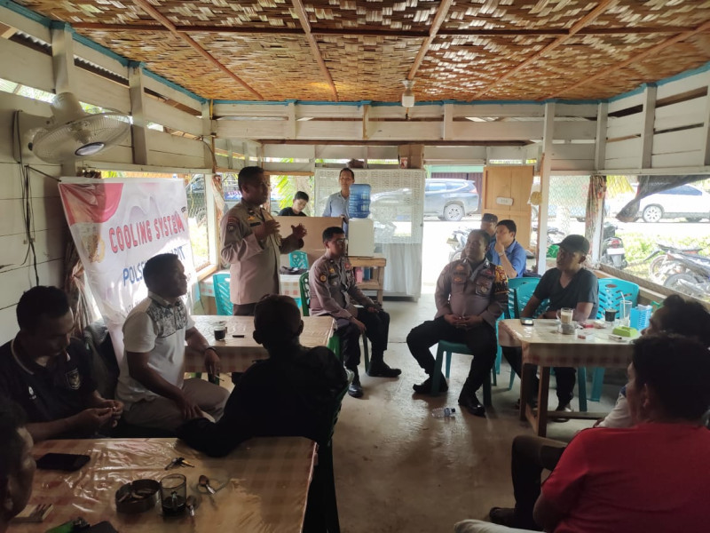 Bhabinkamtibmas Polsek Sungai Apit Lakukan Cooling System di Kecamatan Sungai Apit