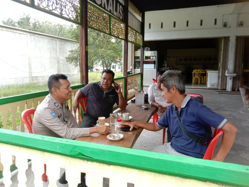 Cooling System, Bhabinkamtibmas Kampung Rempak Ajak Warga Jaga Persatuan Usai Pilkada