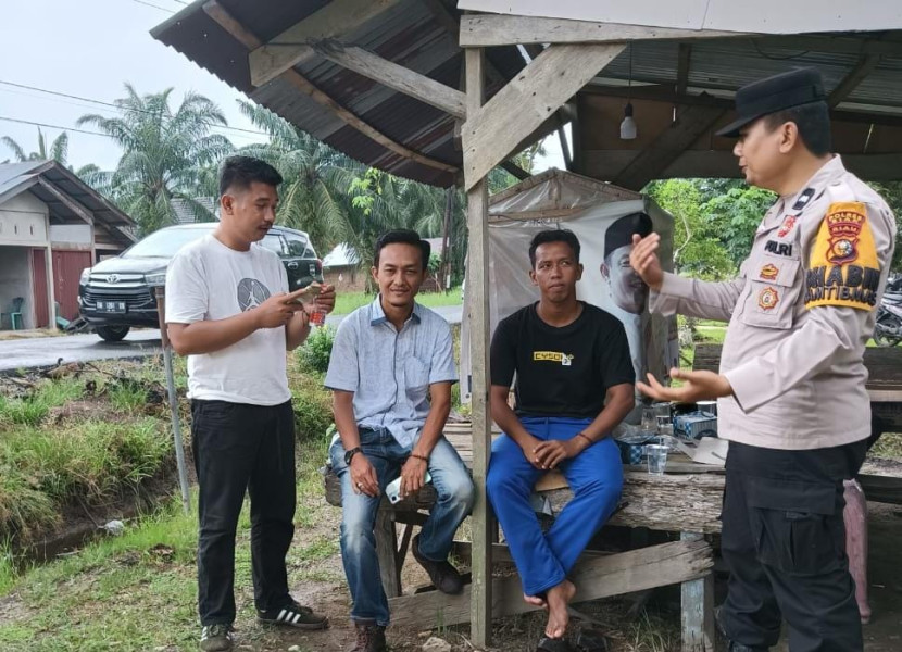 Polsek Sungai Apit Gelar Cooling System di Kampung Sungai Kayu Ara