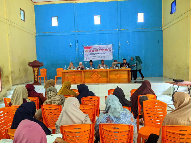 Polsek Sungai Apit Gelar Kegiatan Cooling System dan Sambang Warga di Kampung Kayu Ara Permai Menjelang Pilkada 2024