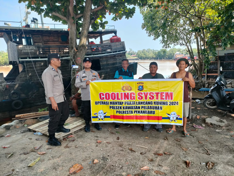Pekanbaru Siap Pilkada: Sinergi Polisi dan Warga di Pelabuhan Rakyat