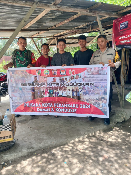 Bhabinkamtibmas dan Babinsa Kelurahan Umban Sari Laksanakan Cooling System di Rumbai